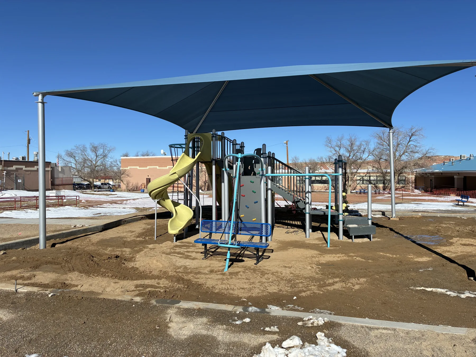 Lake Valley Navajo School playground with shade structure