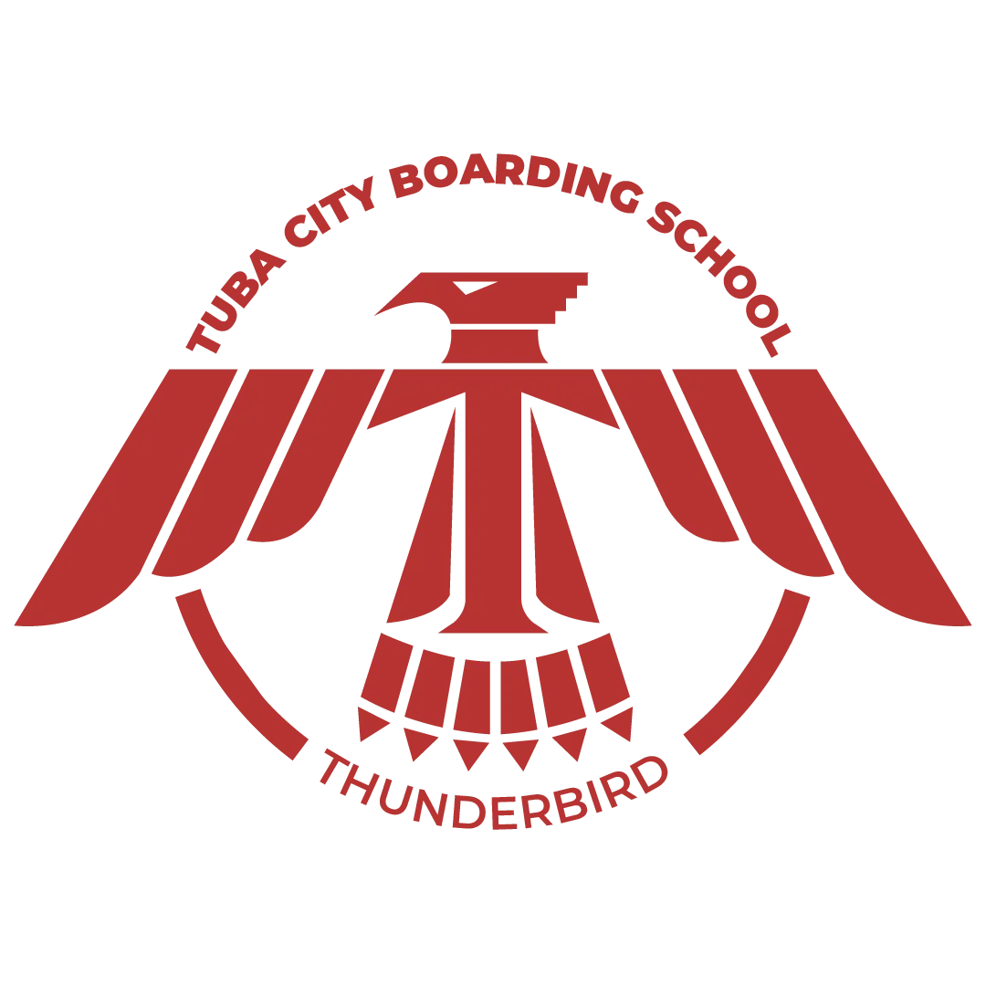 Tuba City Boarding School crest with a red Thunderbird and school name